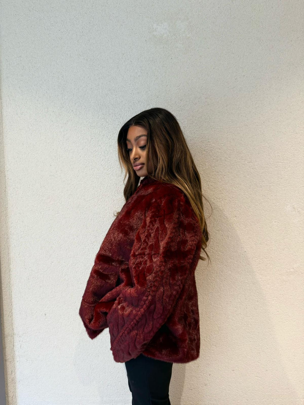 Fourrure à capuche et boutons